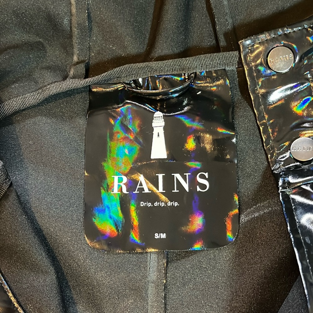 Women’s black oil slick hooded Rains jacket